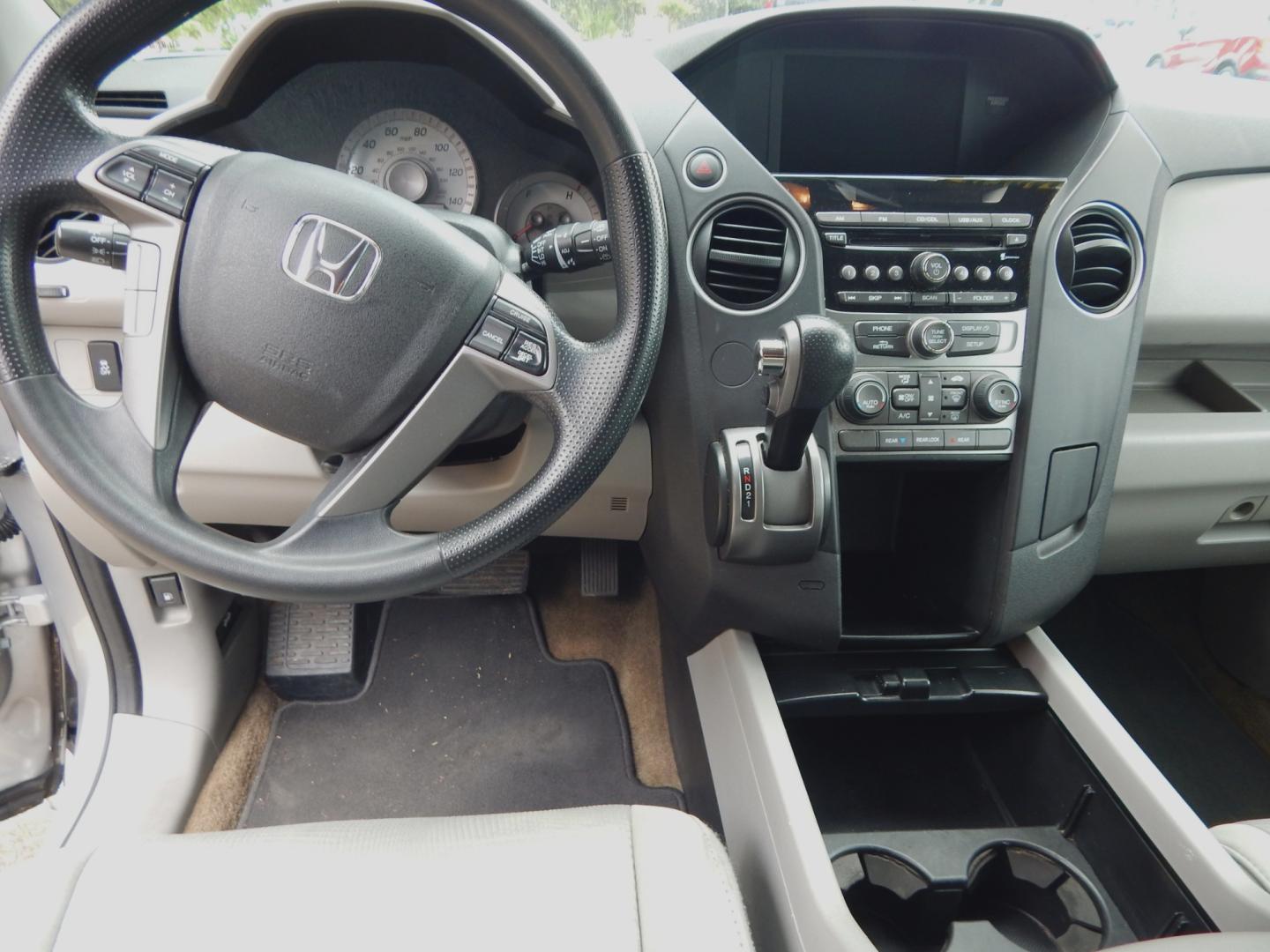 2013 Silver Metallic /Gray Honda Pilot LX (5FNYF3H29DB) with an 3.5L V6 engine, Automatic transmission, located at 3120 W Tennessee St, Tallahassee, FL, 32304-1002, (850) 575-6702, 30.458841, -84.349648 - Used Car Supermarket is proud to present you with this loaded immaculate 2013 Honda Pilot LX. Used Car Supermarket prides itself in offering you the finest pre-owned vehicle in Tallahassee. Used Car Supermarket has been locally family owned and operated for over 48 years. Our Pilot LX has been servi - Photo#4